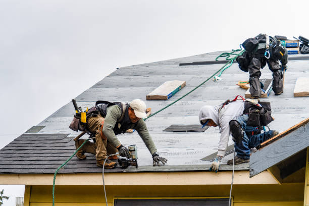 Professional Gutter Installation technician working in Leominster, MA